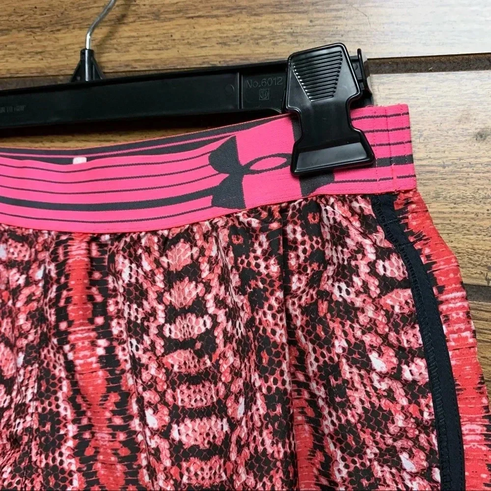 Under Armour pink running shorts size S heat gear